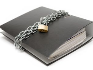 a black book with a lock and chain on it
